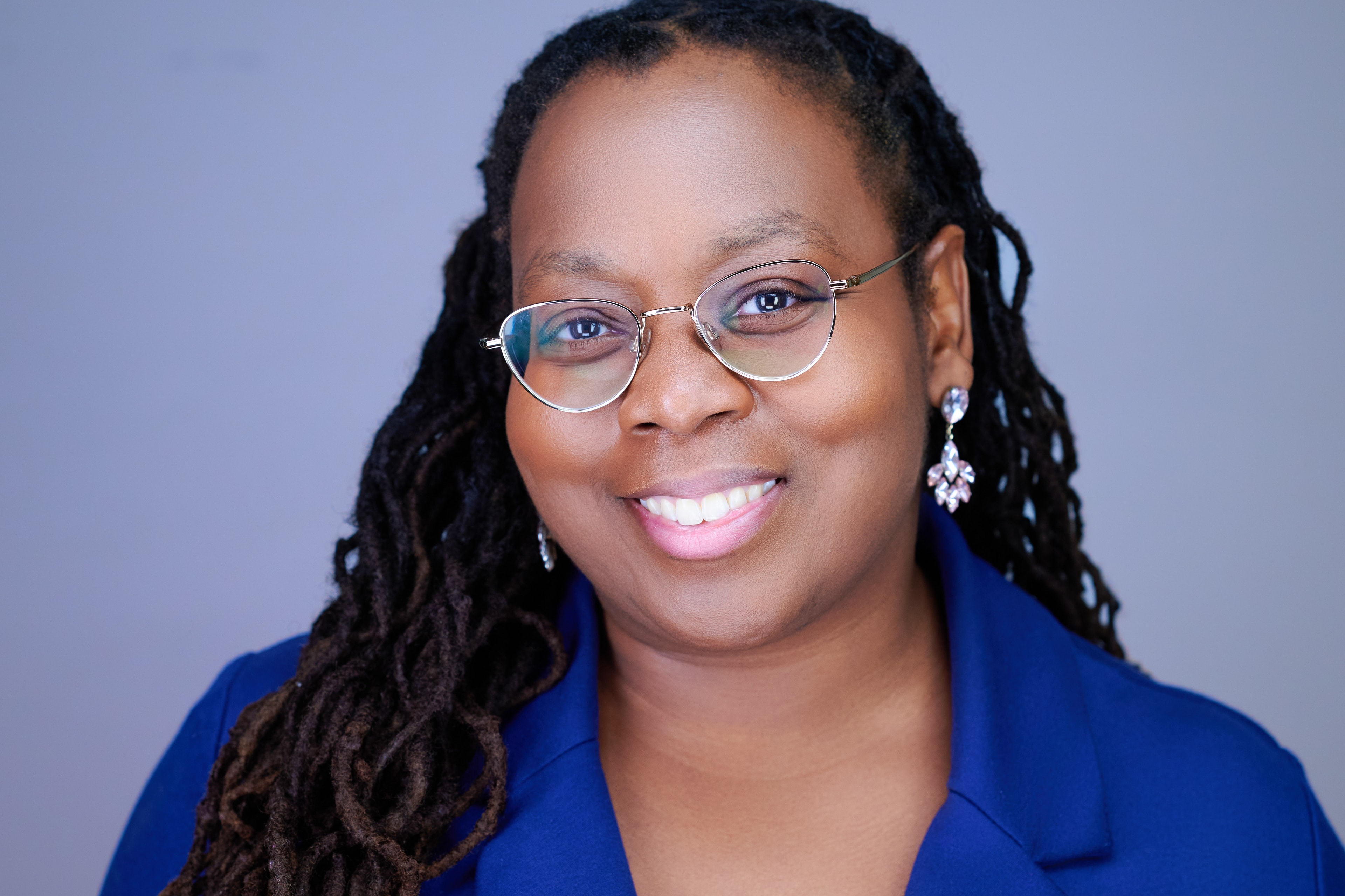 Kim — headshot by John Ricard Photography